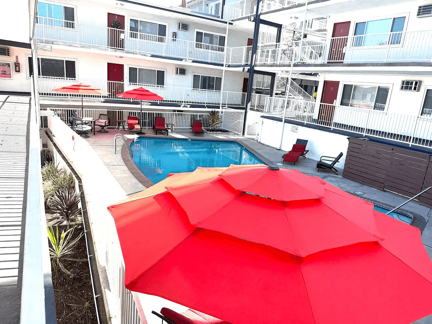 community pool and outdoor social spaces