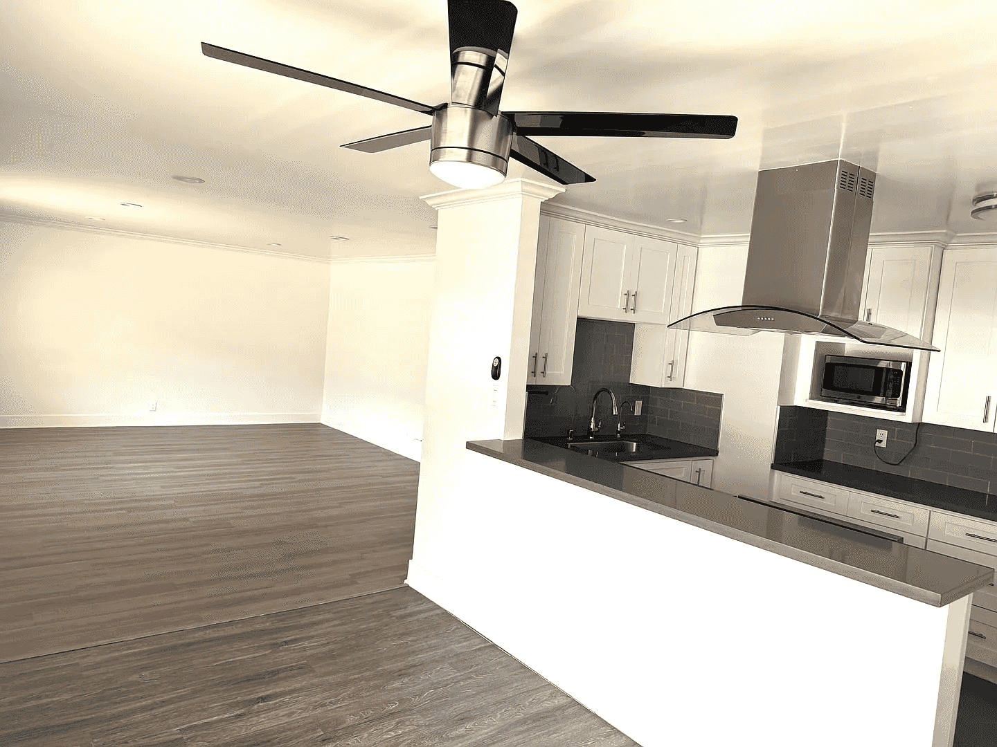 open concept living area with recessed lighting