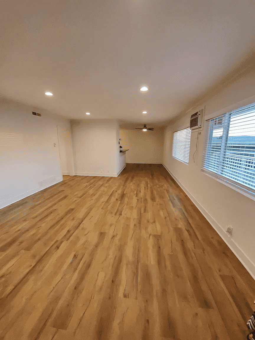 open living area with recessed lighting