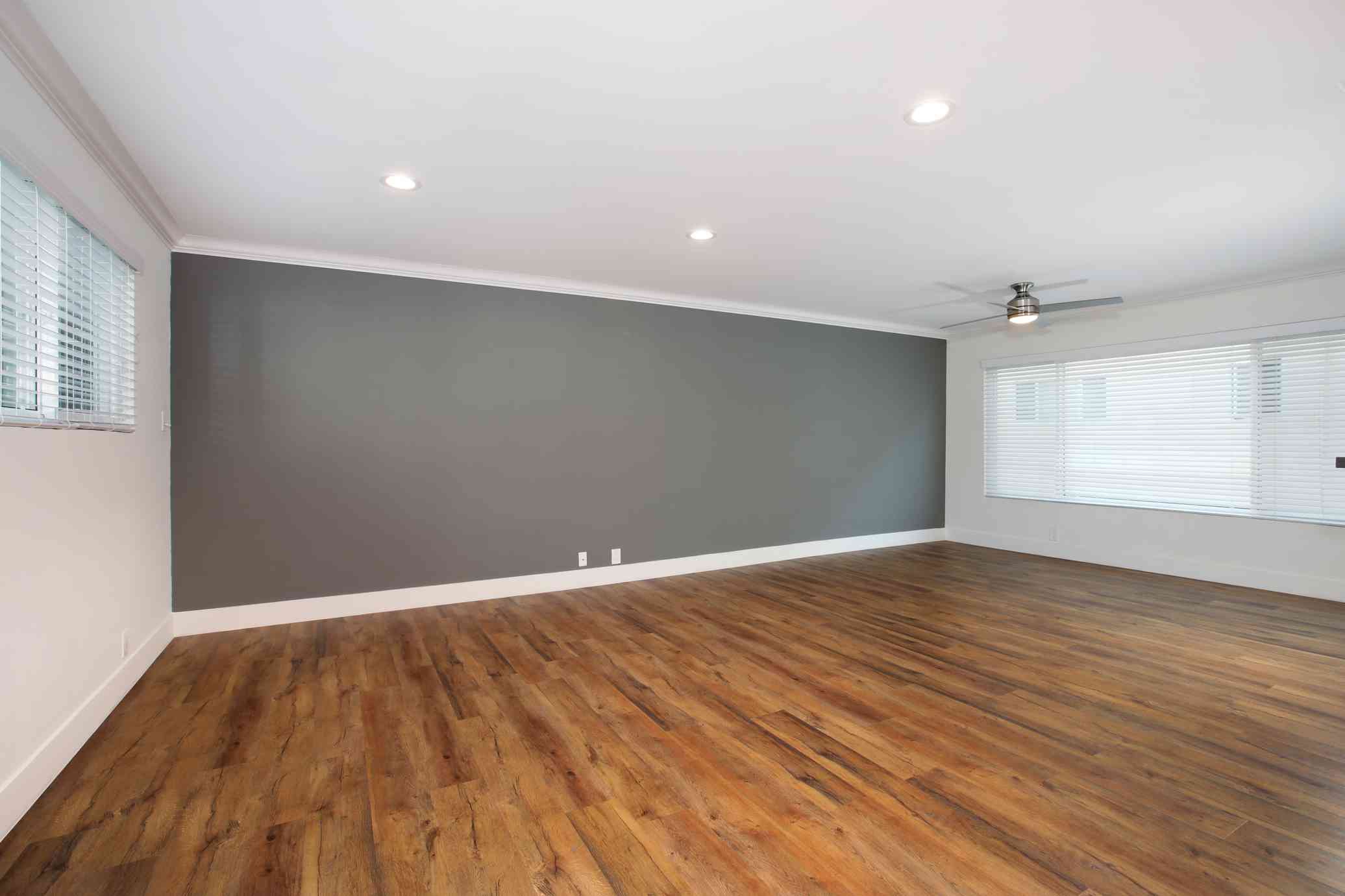 living room with modern charcoal accent wall