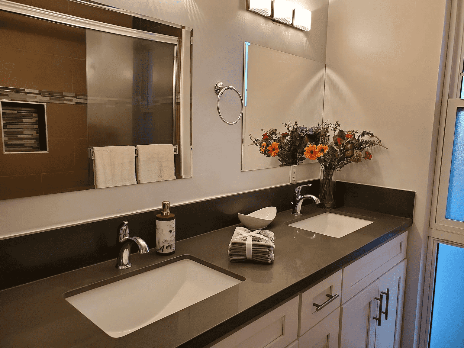 master bath with quartz counters and modern fixtures